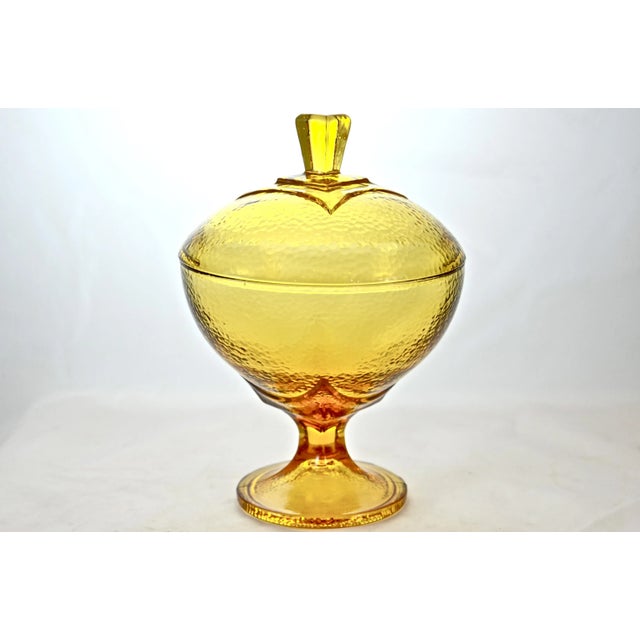 Tall vintage Mid-Century amber pebble glass pedestal bowl with a squared finial handle lid. No maker's mark.