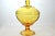 Tall vintage Mid-Century amber pebble glass pedestal bowl with a squared finial handle lid. No maker's mark.