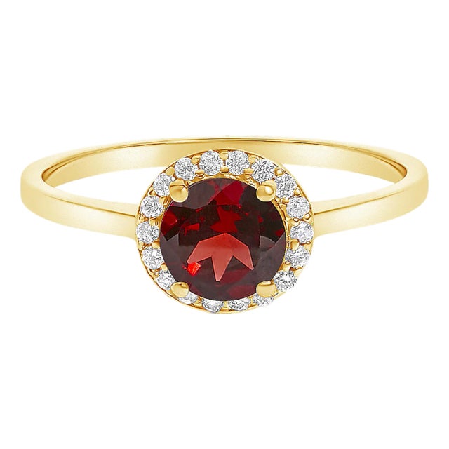 10K Yellow Gold Red Garnet and 1/10 Cttw Diamond Halo Ring For Sale