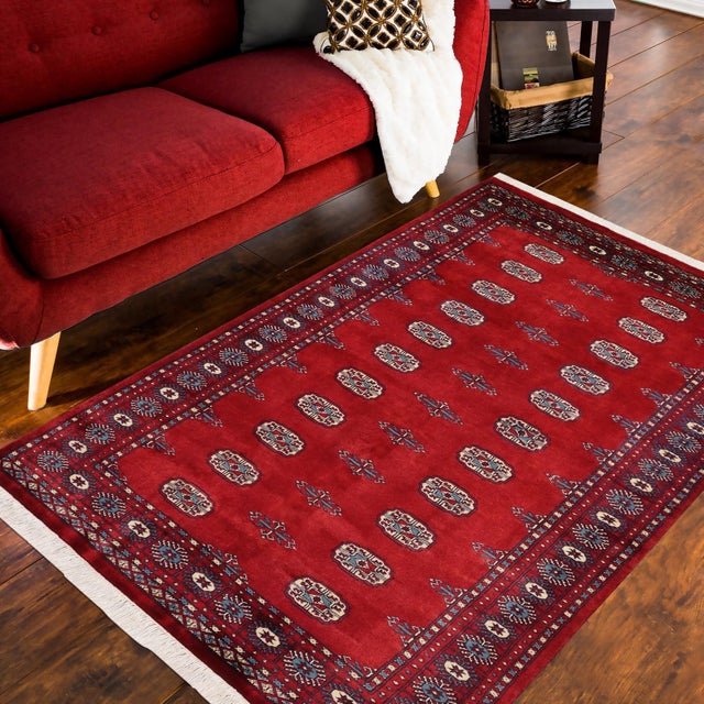 Transform the interior of your home with a beautiful hand-knotted Bokhara rug. Meticulously crafted with intricate...