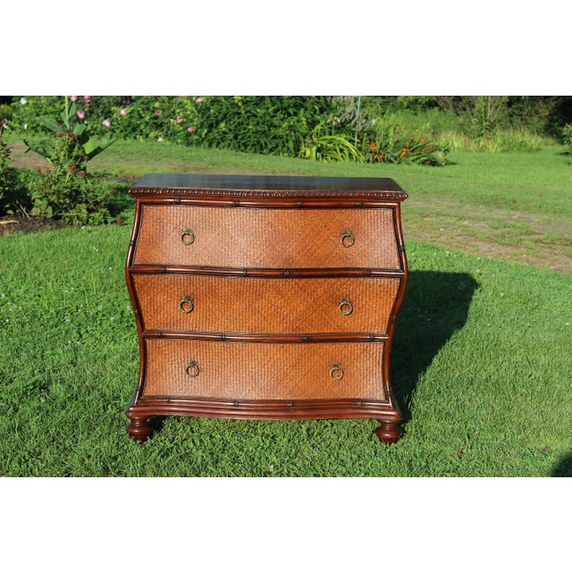 The combination of faux bamboo and rattan has produced an impressive chest of drawers by Ethan Allen. It was made in the...