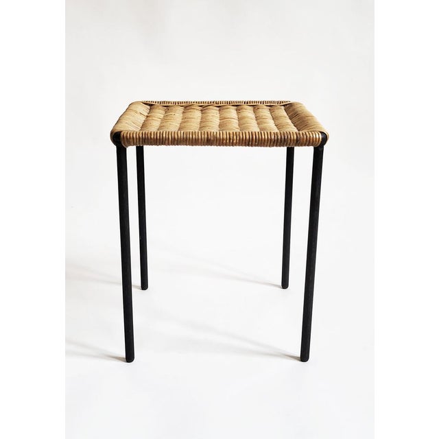 Mid-century rattan & iron side table, carl auböck this exquisite modernist-minimalist side table designed by carl auböck...