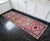 Hailing from Southeastern Anatolia, this striking 1960s vintage runner rug beautifully encapsulates the rich weaving...