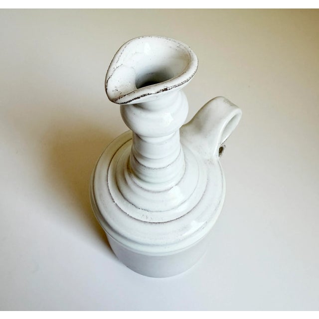 Versatile glazed ceramic vessel that can serve as a carafe, cruet, or vase. Attributed to Sigurdar Haukssonar for...