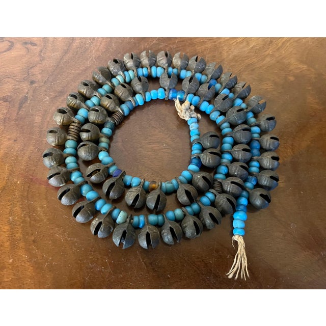 Long Strand of Brass Bronze Bells Strung With Turquoise Glass Trade Beads For Sale - Image 10 of 13