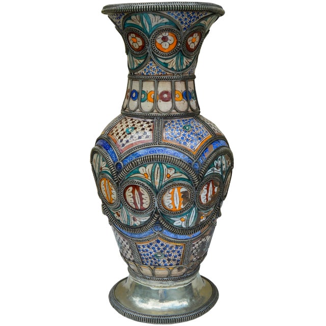 Antique handcrafted and glazed ceramic vase from Fez, Morocco. Featuring an intricate hand-painted Moorish pattern in...