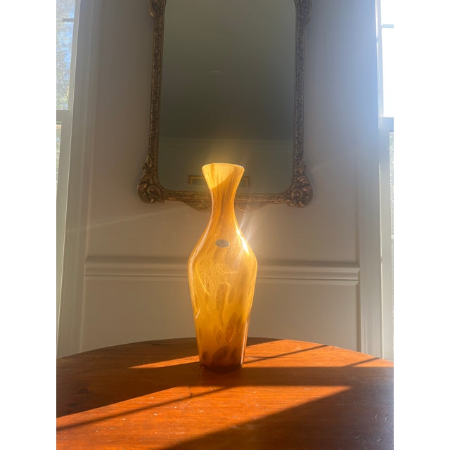 This hand blown Italian glass vase is striking. Its light golden tortoiseshell pattern catches sunlight so beautifully and...