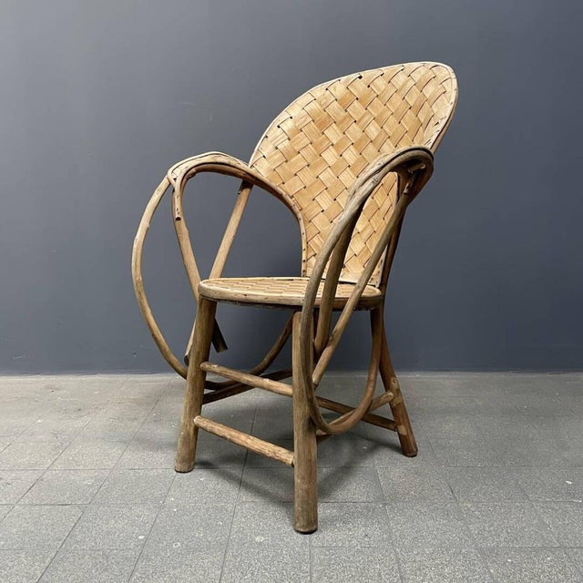 Beautiful braided or woven folk art chair. The back and seat of this chair are beautifully woven and resemble birch wood....