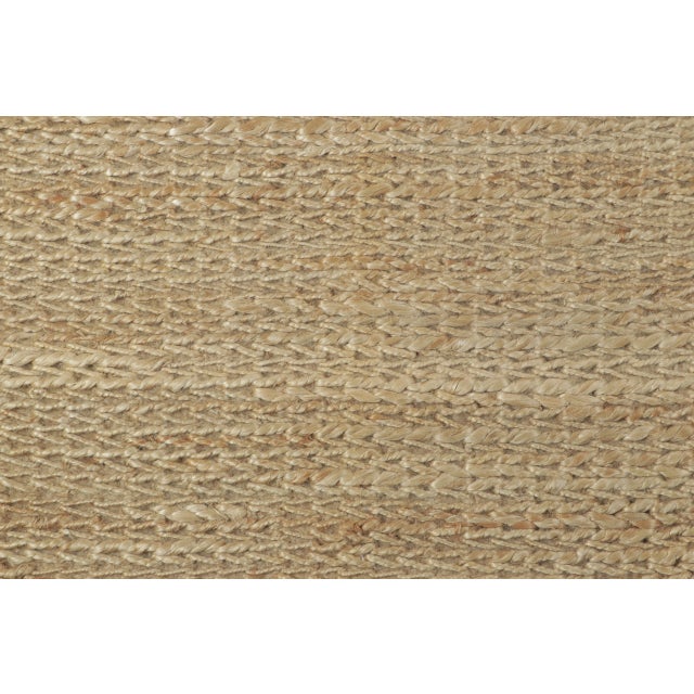 Handwoven in natural jute, this 2x3 contemporary gift-sized rug joins Rug & Kilim’s Textural collection. Featuring an...
