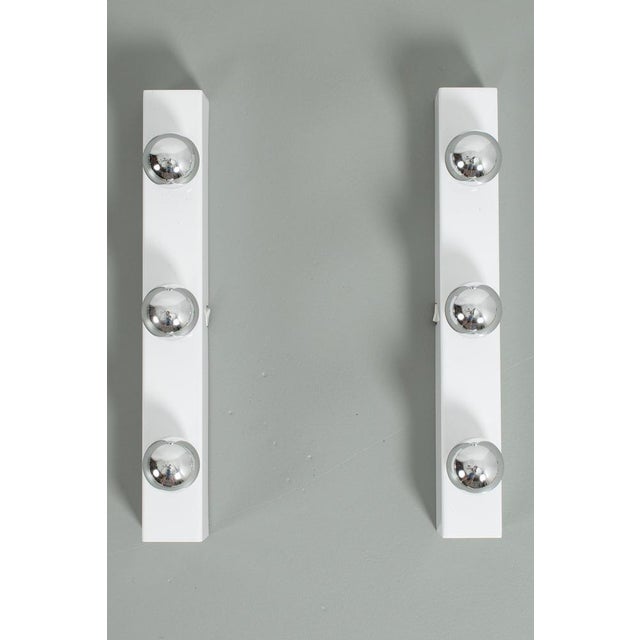 Pair of 2 white mirror lamps. These are mostly being used in the dressing room of the theatre. Of course you can use them...