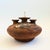 A vintage studio pottery oil lamp vase. Features 3 necks with an removable wick in the center opening for using as an oil...