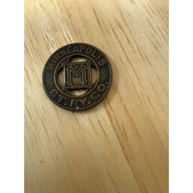A pair of Street Car Token Minneapolis Minnesota Street Railway Co 1940s Good For One Fare A pair of collectible tokens...