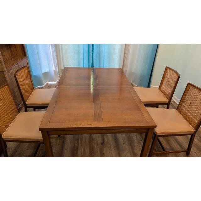 A Michael Taylor for Baker Furniture extendable dining table. This wonderful mid century modern dining table is from...