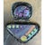 This vintage handcrafted sterling silver pendant centers on a hinged, two-tiered form set with dazzling dichroic glass...