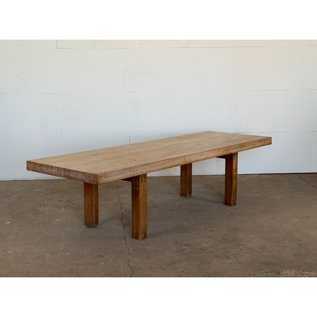 This large pine dining table, or conference table, was made by a Danish cabinetmaker in the 1980s. The rectangular top is...