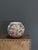 This striking hand-coiled seed jar is a premier example of contemporary Acoma Pueblo pottery from New Mexico. Standing...