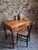 Compact oak writing table dating from around 1930–1950. Made of solid oak with a warm natural patina, it features one...