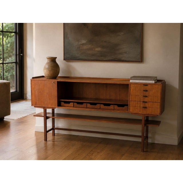 Axel Bäck attrribution, Monumental Credenza or Sideboard, Teak, Rosewood, Sweden, 1950s A monumental teak credenza or...