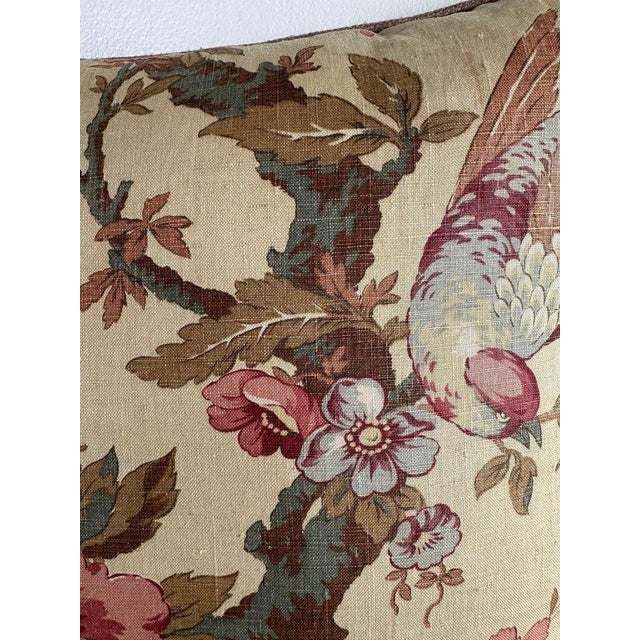 Decorative pillow made from a floral printed linen with an archival European feel, featuring flowering branches, blossoms,...