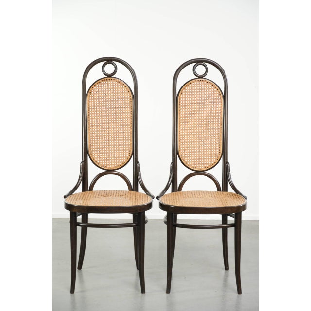 We are offering this set of 4 original vintage Thonet "Long John" design webbing dining chairs/bistro chairs with...