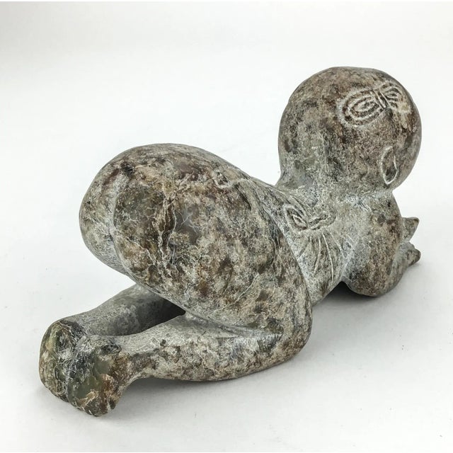 An early 1900’s stone sculpture carved into a child striking a pose of abundance and gratitude. Asian mythology is at its...