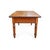 This handsome 19th-century country farm table featuring a substantial plank wood top with beautifully aged edges and a...