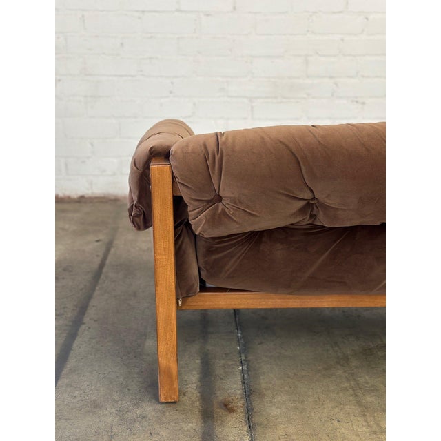 W87 D35 H27 SW76 SD22 SH18 AH22 Custom made sofa made from solid wood with a medium honey walnut stain. Upholstered in a...