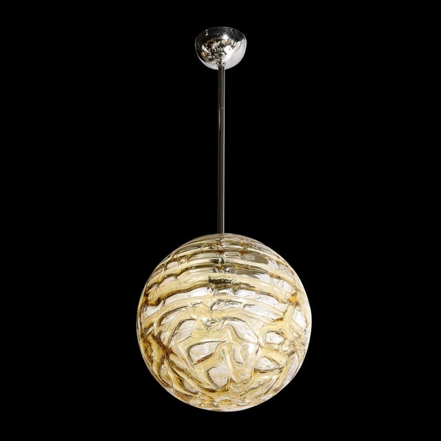 This Mid-Century Modernist Hand-Blown Glass Pendant Chandelier by Mazzega originates from Murano, Italy, Circa 1970....
