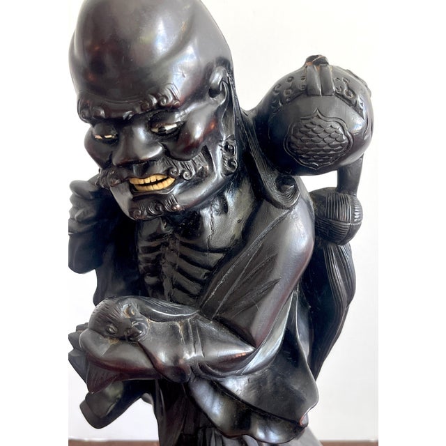 19th Chinese Carved Hardwood Figure of an Immortal Holding a Bat For Sale In West Palm - Image 6 of 10