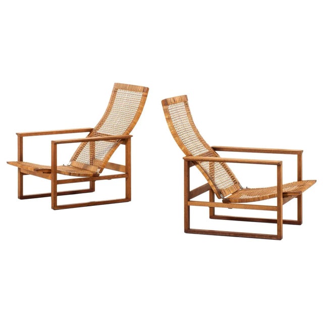 Rare pair of easy chairs model BM-2254 / Slædestolen designed by Børge Mogensen. Produced by Fredericia Stolefabrik in...
