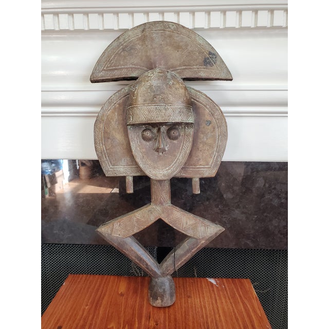 This listing is for a Kota reliquary guardian figure, known as a mbulu ngulu, originating from Gabon. These figures were...