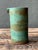 This vintage studio pottery stoneware vase is a refined expression of mid-century ceramic design, distinguished by its...