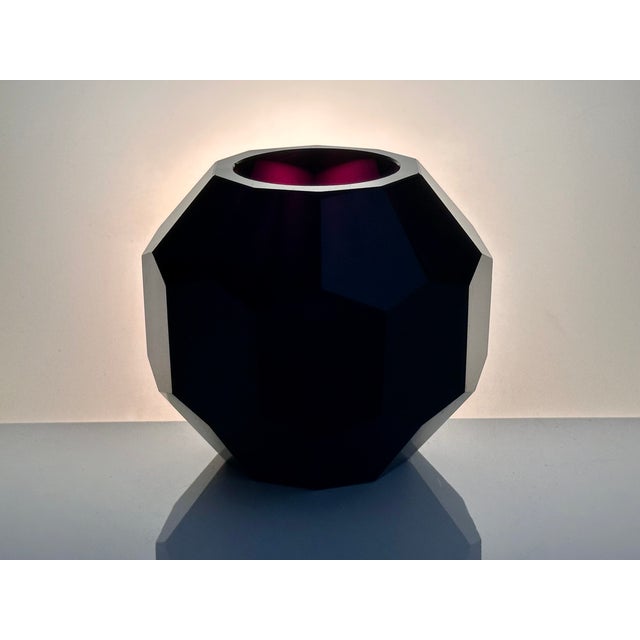 This high quality Art Nouveau crystal glass vase was hand-cut in Bohemia during the 1920s. It features a 10-fold facet...