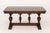 Jacobean Style Oak Refectory Table, with removable and extending leaf on urn form and foliate carved base. 30.5" H x 60" W...