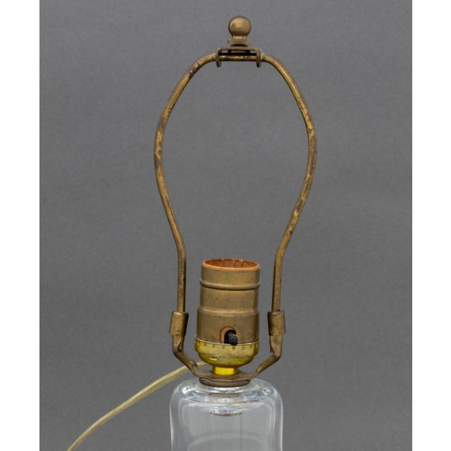 Simon Pearce Clear Glass Table Lamp, marked "Simon Pearce" to underside. Overall: 17.5" H x 6" Diameter. Provenance: From...