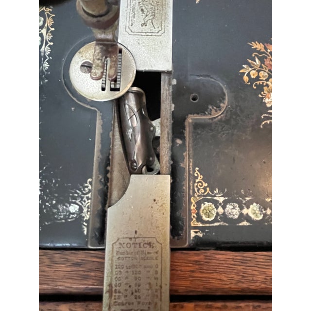 Antique 1903 'New Home' Treadle Sewing Machine Series B in Oak Cabinet Working Condition For Sale - Image 9 of 12