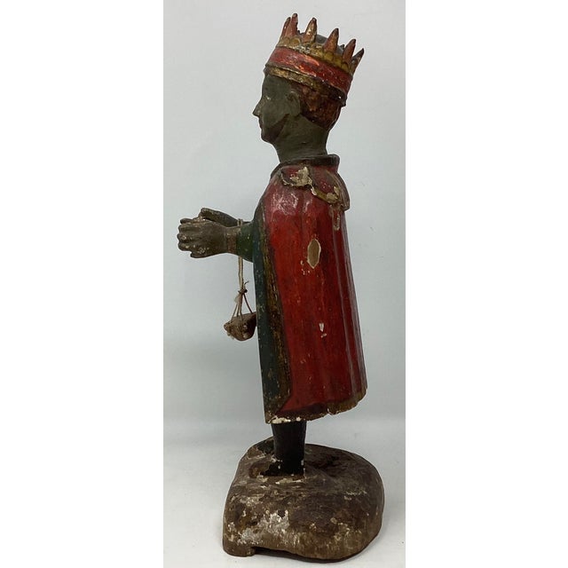 18th C polychrome painted hand carved wood figurine of a Black King bearing a gift. Part of a larger Nativity Scene. These...