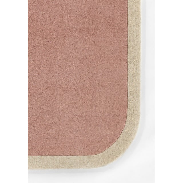 If you’re looking to add texture to a room without pattern, this vivid pink rug brings color and modern minimalism to your...