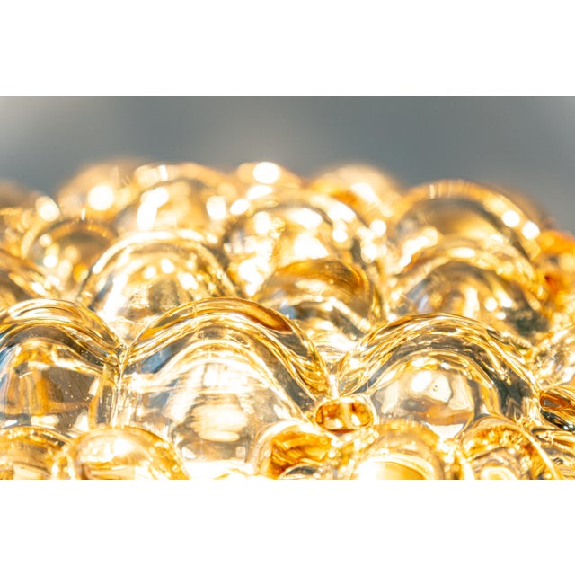 A round smoke tone bubble glass ceiling mount fixture designed by helena tynell for limburg, manufactured in germany,...