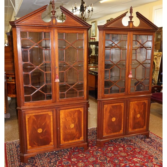 Pair of English Regency Style Mahogany Inlaid Corner Cabinets Dimensions : 41" Wide X 28" Deep X 85" Tall This gorgeous...