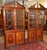Pair of English Regency Style Mahogany Inlaid Corner Cabinets Dimensions : 41" Wide X 28" Deep X 85" Tall This gorgeous...