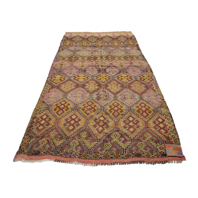 Vintage handwoven kilim rug from Kars region of Turkey. Approximately 55-65 years old. In very good condition.
