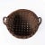 A beautiful antique two handled basket. This basket features a splint style weave with wooden handle. A marvelous catchall...