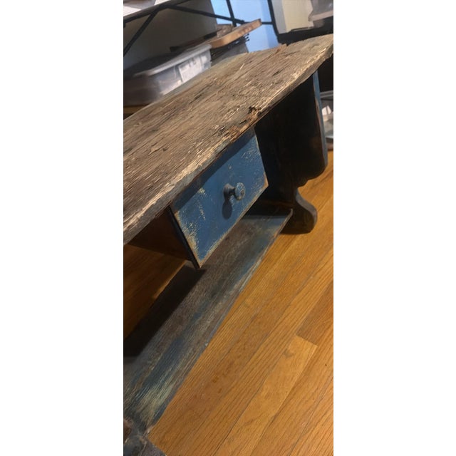 This piece represents American country or folk furniture traditions from the late 19th to early 20th century. Such benches...