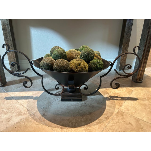 Hand-forged centerpiece by Jan Barboglio with scrolled handles and pedestal base. Rustic interior patina and sculptural...
