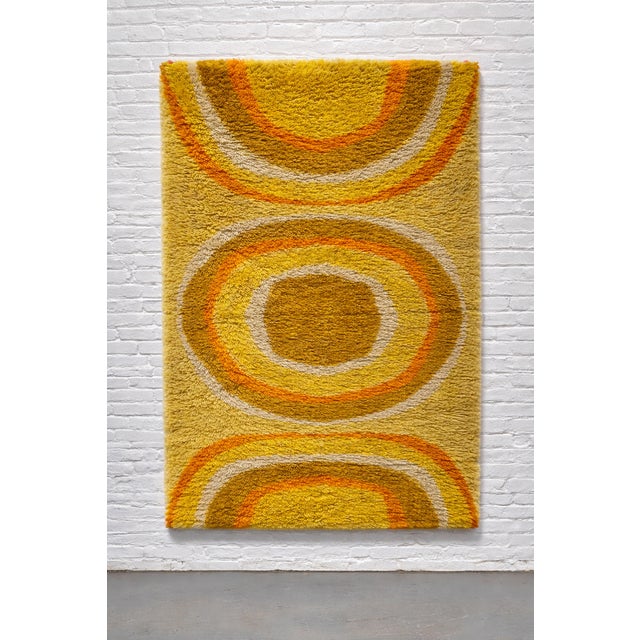 Mid Century Modern original 1970's rya rug brings instant warmth and personality to any space. Measuring approximately 5’...