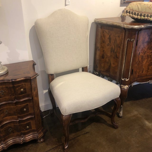 Classic Italian style side chair featuring soft golden linen blend custom upholstery, hand carved and hand finished. Italy