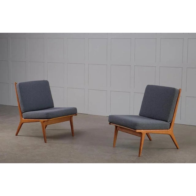 Rare model. Designed by Karl-Erik Ekselius, produced by JOC in Vetlanda, Sweden, 1960s. Solid oak frame and newly...