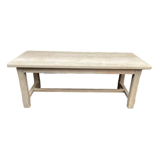 This is an authentic French farmhouse table which has been stripped of all colored finishes. Made of oak, this table now...