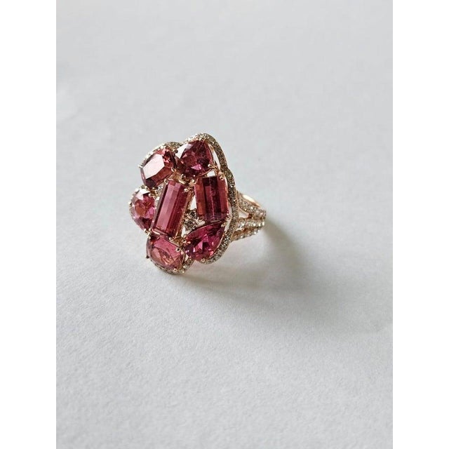 A very gorgeous and beautiful, Tourmaline Cocktail Ring set in 18K Rose Gold & natural Diamonds. The weight of the...